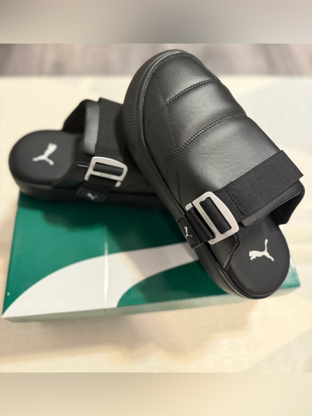Puma Black Quilted Slide Sandals  Mullet with Buckle Strap